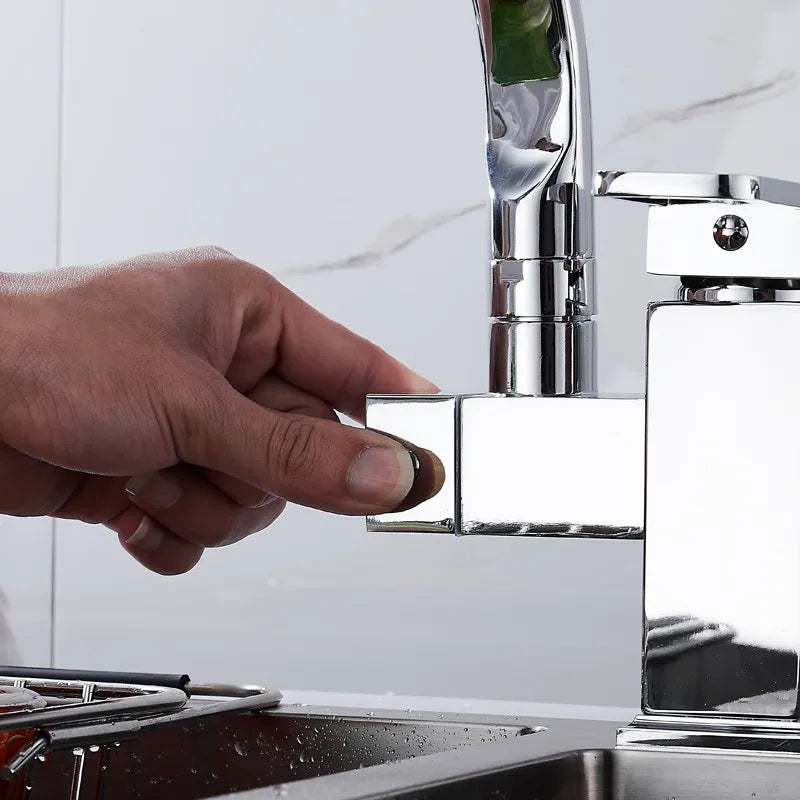 Black deck-mounted kitchen sink faucet with flexible pull-out spray, spring spout, hot and cold water, chrome finish by MC THE BLACK DIAMOND