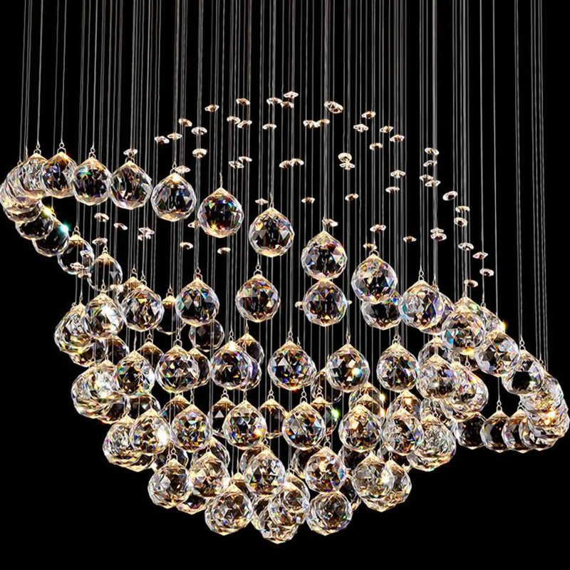 MC THE BLACK DIAMOND LED crystal chandelier hanging in a stylish living room, featuring sparkling crystals and modern design.