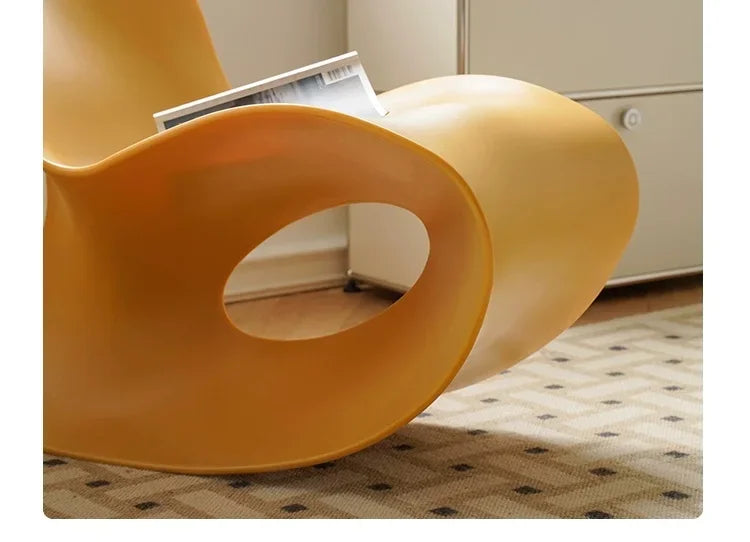 Modern MC THE BLACK DIAMOND rocking lounge armchair in white polyethylene with a sleek, rotational-molded design for contemporary spaces.