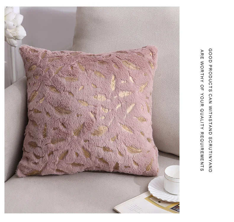 Gold feather decorative pillow cover from 𝕄𝕔 𝕋𝕙𝕖 𝔹𝕝𝕒𝕔𝕜 𝔻𝕚𝕒𝕞𝕠𝕟�