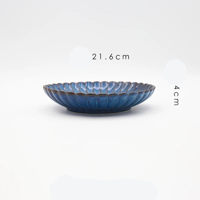 MC THE BLACK DIAMOND Western dinnerware set with kiln-variable glaze, includes plates, bowls, and cups on a table.