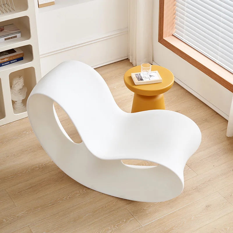 Modern MC THE BLACK DIAMOND rocking lounge chair made of polyethylene with a sleek post-modern design, suitable for home relaxation.