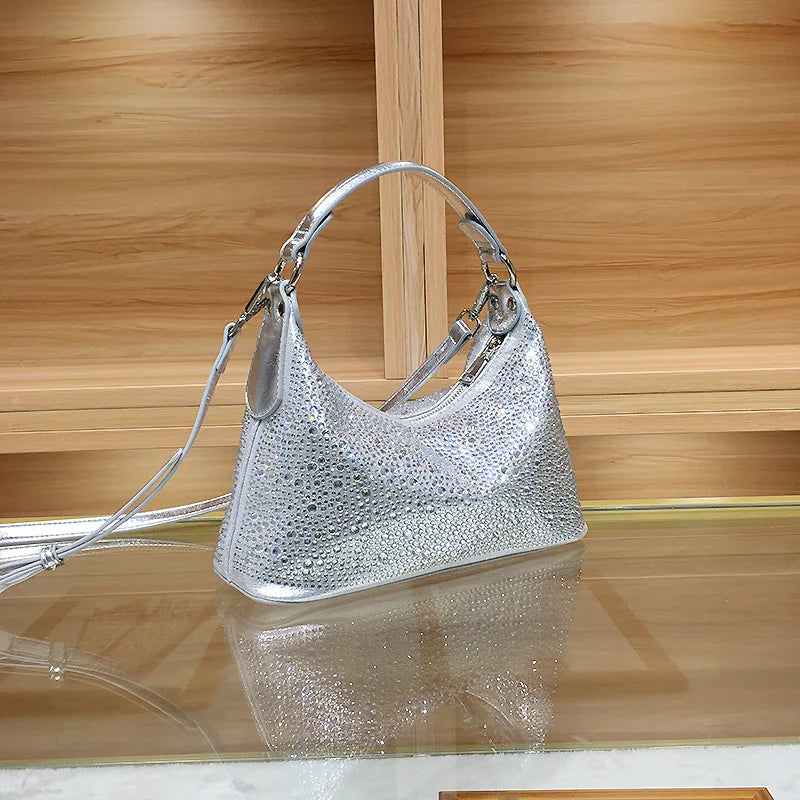 Womenโs shiny evening handbag by ๐๐ ๐๐๐ ๐น๐๐๐๐ ๐ป๐๐๐๐ ๐๏ฟฝ