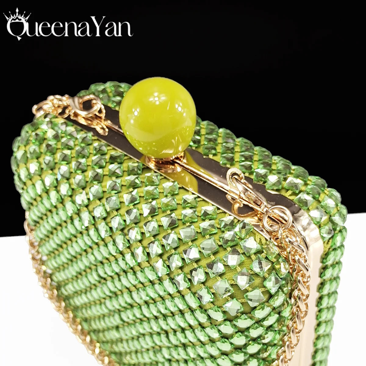 Green pointed toe shoe and matching bag set by Queena Yan, featuring rhinestones and high heels for elegant party looks.