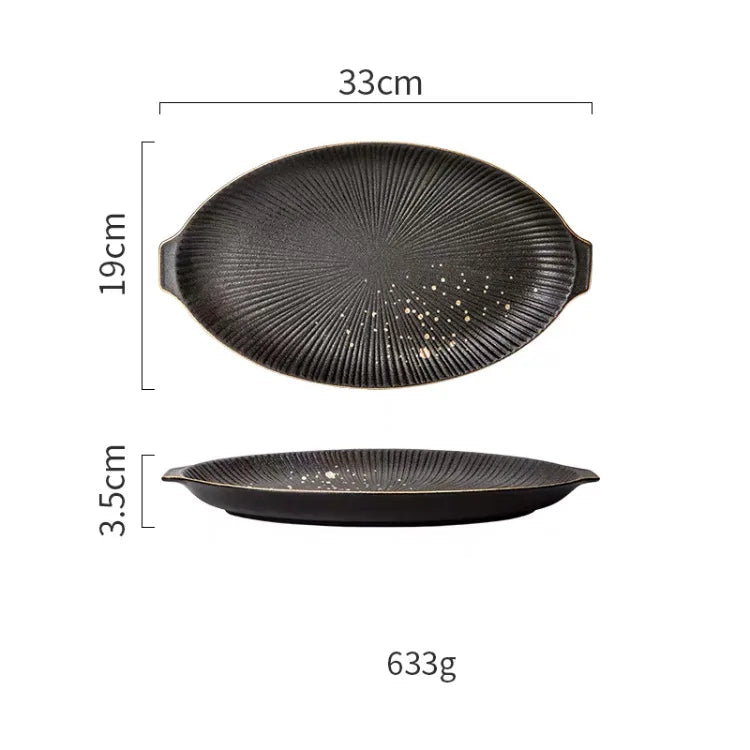 Luxury golden and black dinnerware set by MC THE BLACK DIAMOND, featuring elegant plates and bowls for sophisticated table settings.