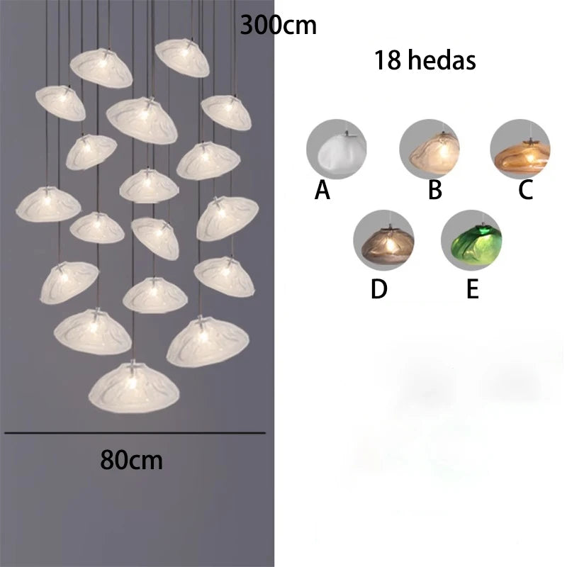 Modern crystal chandelier from MC THE BLACK DIAMOND featuring multiple hanging crystals and elegant lighting design.