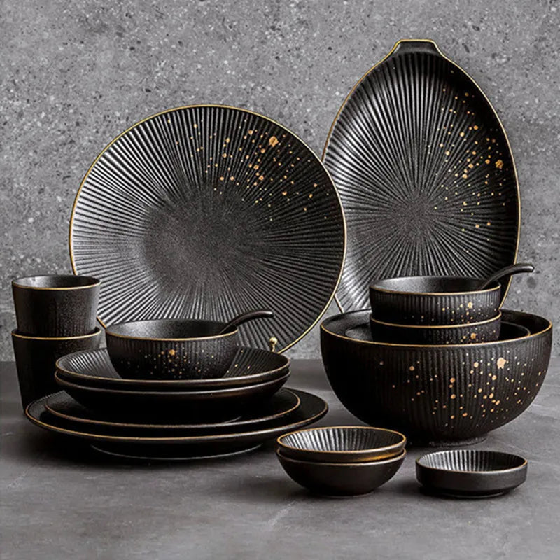 Black porcelain dinner plate with gilt rim from ๐๐ ๐๐๐ ๐น๐๐๐๐ ๐ป๐๐๐๐ ๐