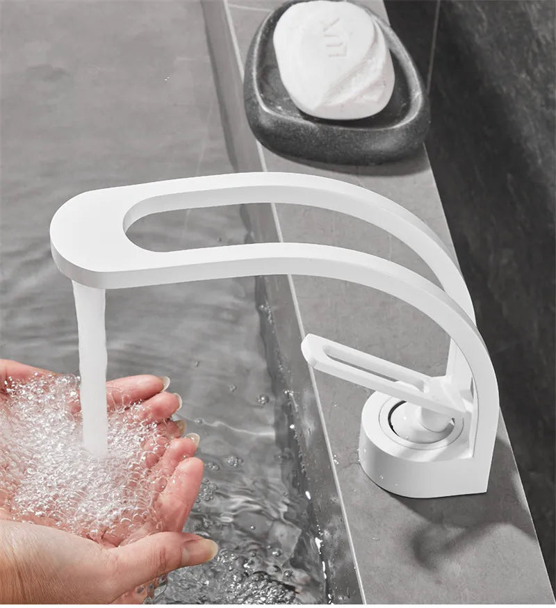 MC THE BLACK DIAMOND black, grey, white, and gold bathroom mixer tap for wash basin, modern bath fixture with sleek design.