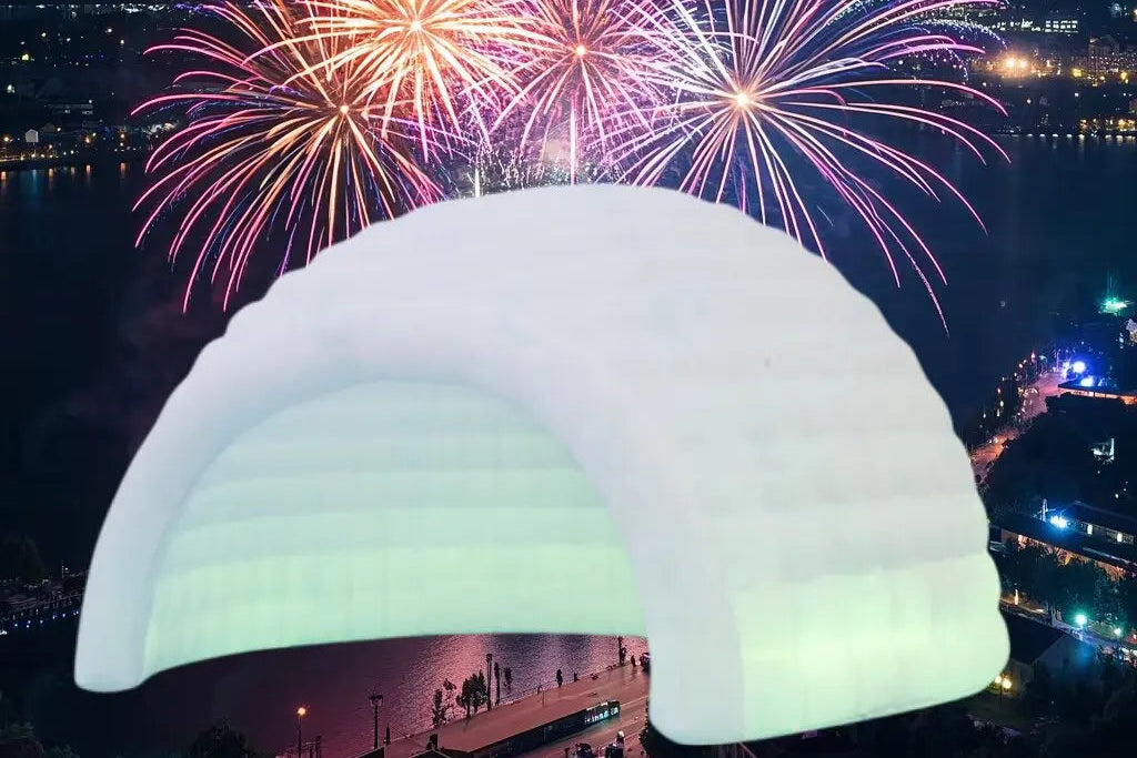 Inflatable MC THE BLACK DIAMOND igloo dome tent, premium air-supported pop-up tent with a white and blue design, set up outdoors.