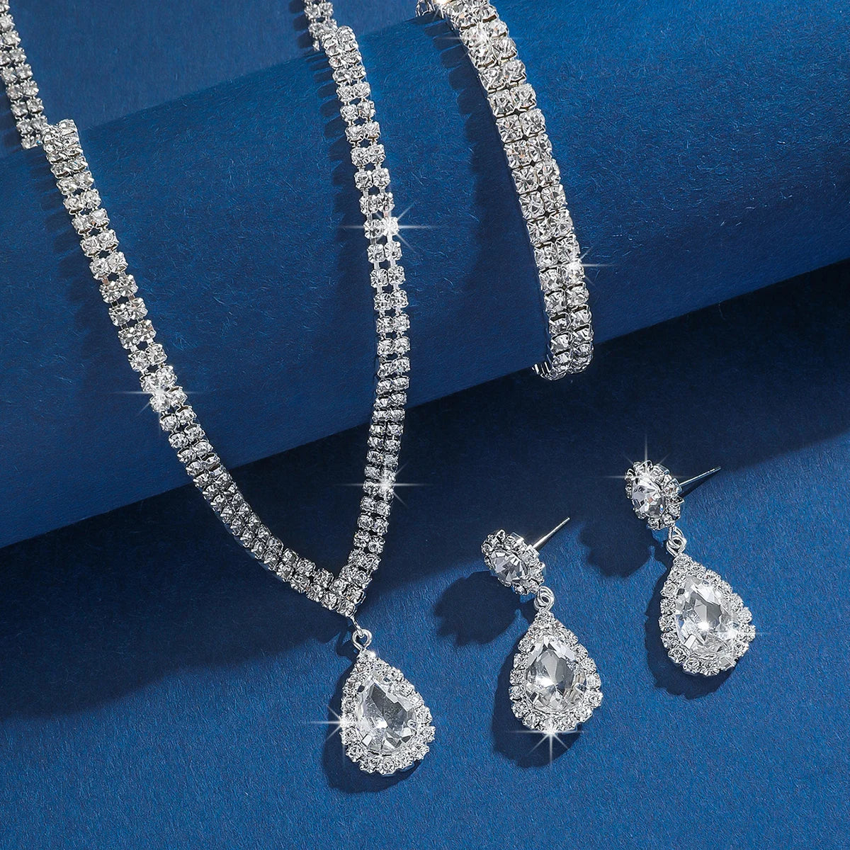 MC THE BLACK DIAMOND Wedding Season women's copper jewelry set with claw chain water drop necklace, earrings, and bracelet.