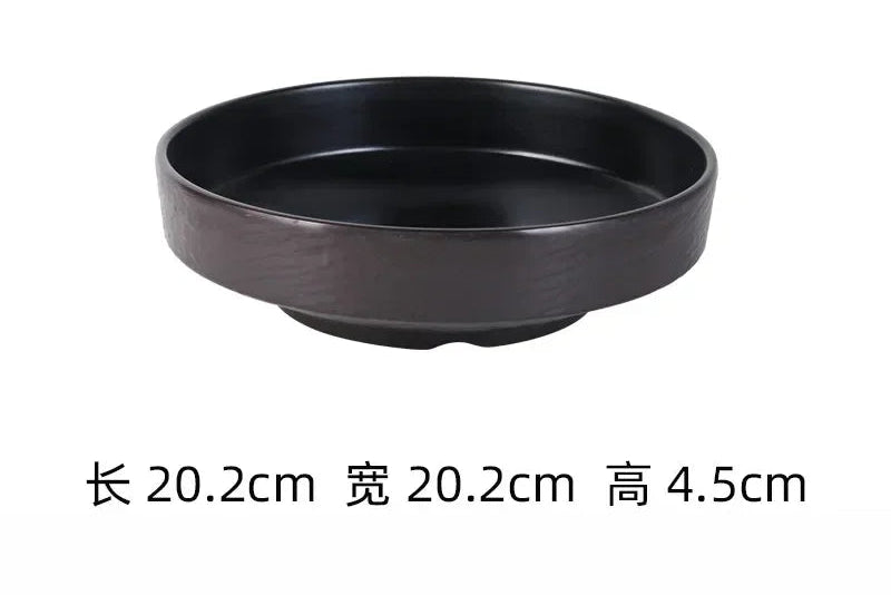 Black frosted melamine dinner plate from 𝕄𝕔 𝕋𝕙𝕖 𝔹𝕝𝕒𝕔𝕜 𝔻𝕚𝕒𝕞𝕠𝕟