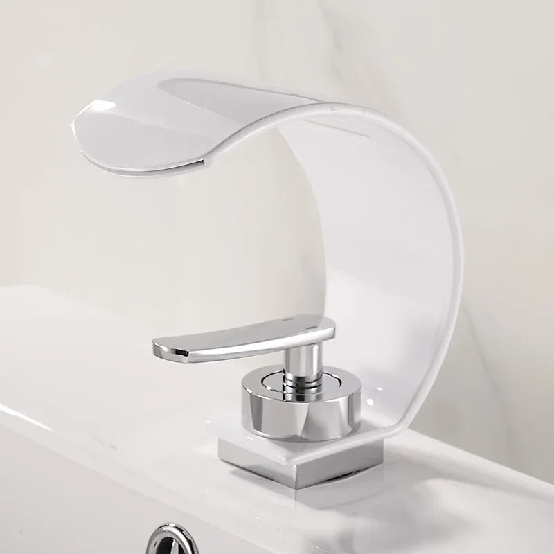 MC THE BLACK DIAMOND waterfall bathroom sink faucet with hot and cold water mixer tap, black and white finish, suitable for bathtubs and sinks.