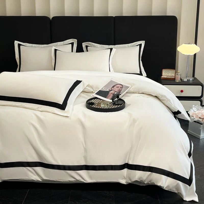White luxury hotel bedding set by MC THE BLACK DIAMOND featuring thick brushed bedsheets for a plush, comfortable sleep.
