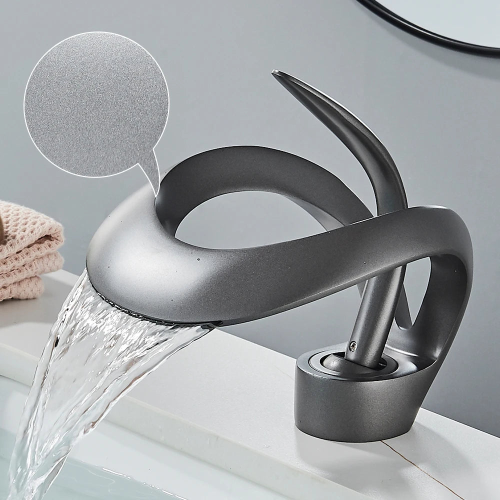 Solid brass waterfall bathroom sink faucet with single handle for hot and cold water, by MC THE BLACK DIAMOND.