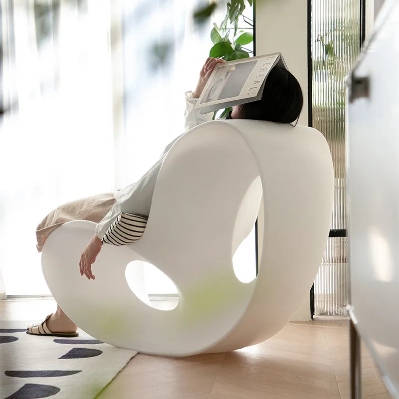 Modern MC THE BLACK DIAMOND rocking PE plastic lounge armchair with a sleek, rotational-molded design for contemporary home decor.