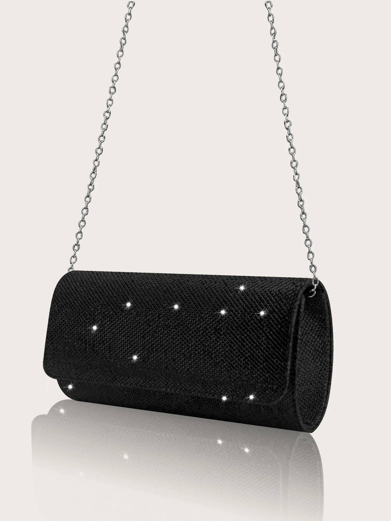 Elegant black MC THE BLACK DIAMOND hand bag with sparkly details, paired with rhinestone necklace, earrings, and bracelet set.