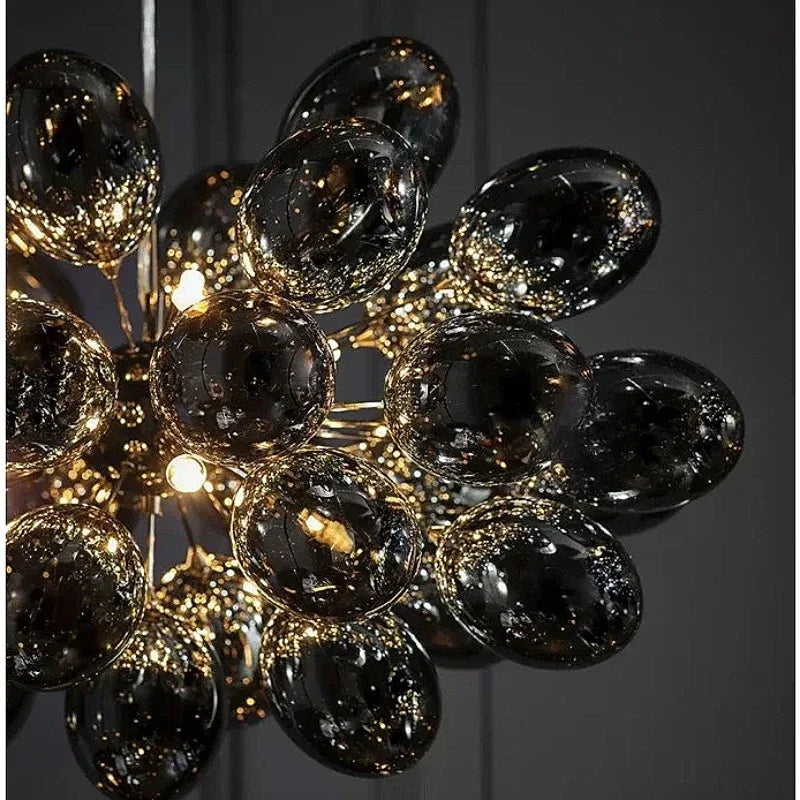 Modern grape-shaped glass chandelier by 𝕄𝕔 𝕋𝕙𝕖 𝔹𝕝𝕒𝕔𝕜 𝔻𝕚𝕒𝕞𝕠𝕟�