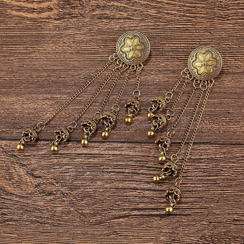 Vintage bohemian bell earrings with tassels, floral design, and Indian-inspired details from ๐๐ ๐๐๐ ๐น๐๐๐๐ ๐ป๐๐