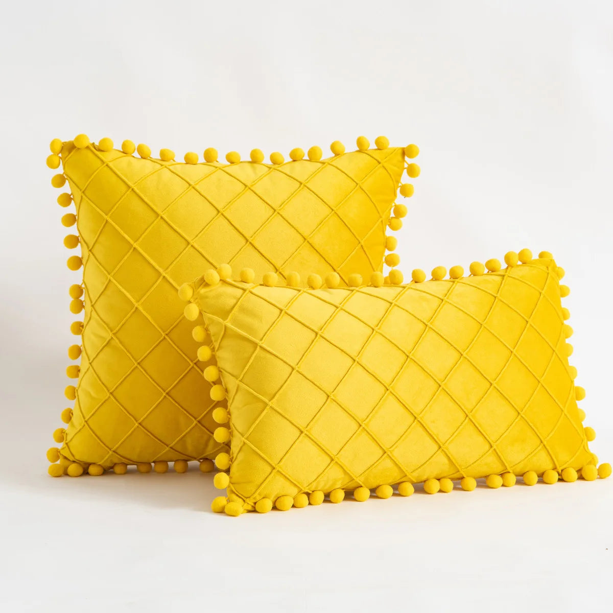 Yellow and orange velvet lumbar pillow cover with diamond stripes, pompom tassels, suitable for 30x50cm or 45x45cm home decor.