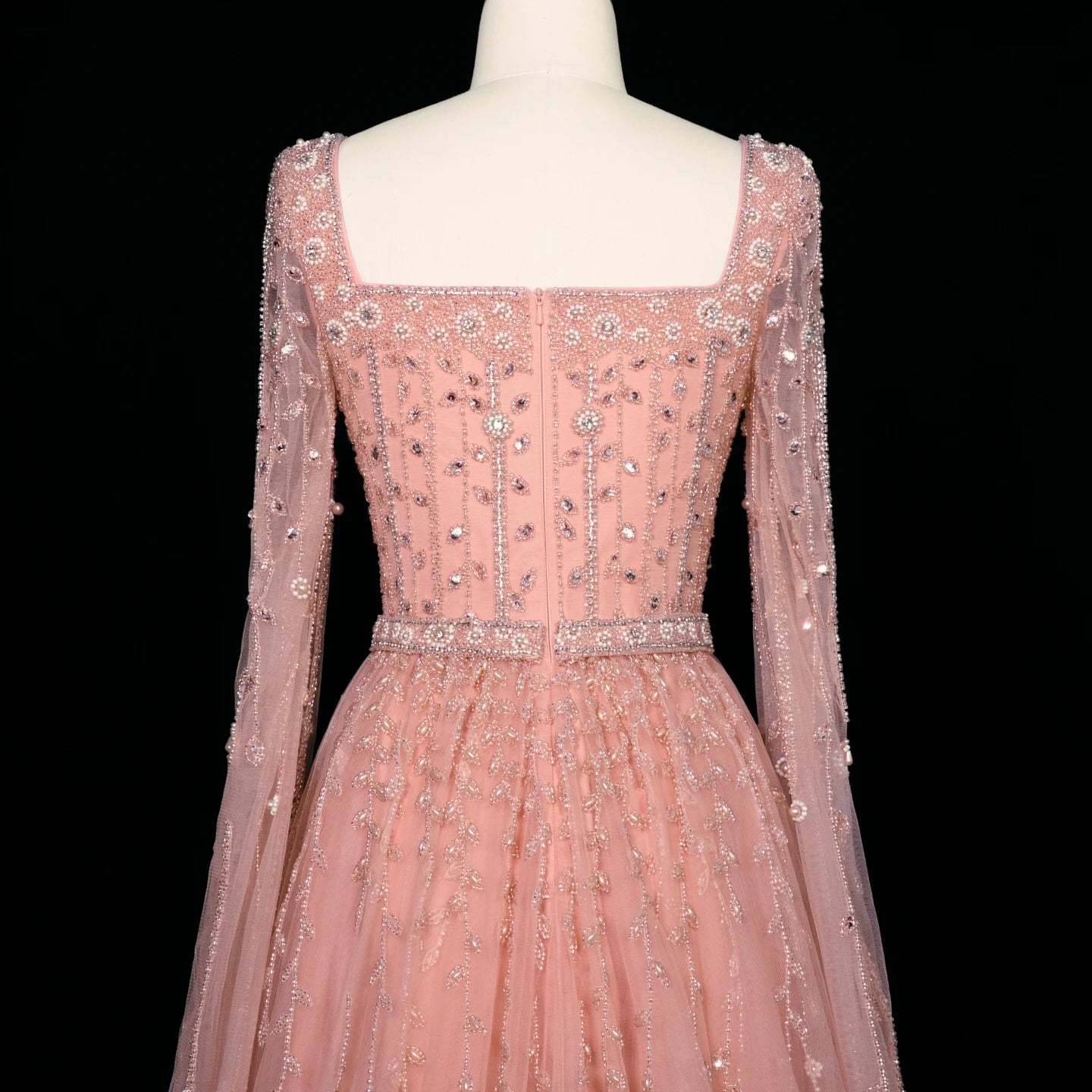 Elegant pink Dubai evening dress by MC THE BLACK DIAMOND, featuring luxurious fabric and intricate design details.