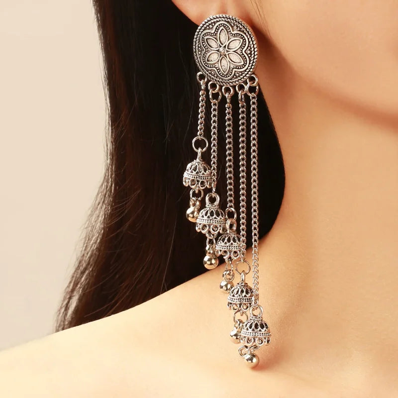 Vintage bohemian bell earrings with tassels, floral design, and Indian-inspired details from ๐๐ ๐๐๐ ๐น๐๐๐๐ ๐ป๐๐
