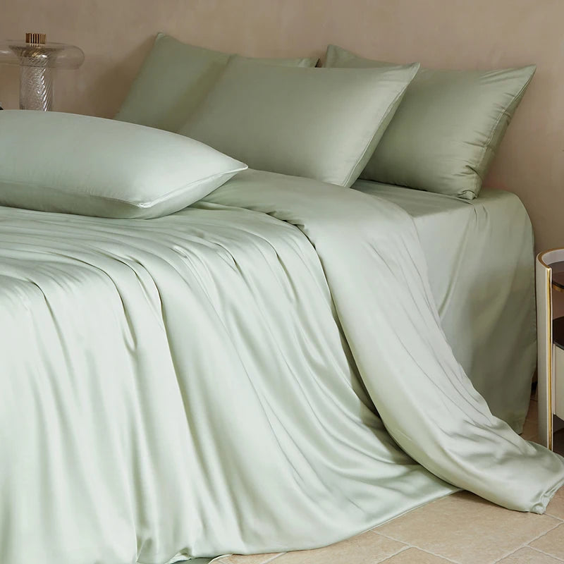 Elegant MC Collection 100% Mulberry Silk Bedding Set with smooth silk sheets and pillowcases, showcasing luxurious home decor.