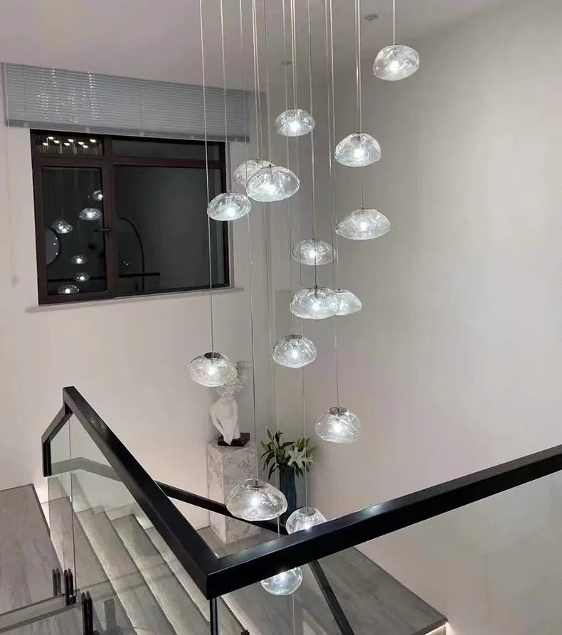 MC THE BLACK DIAMOND Nordic stair chandelier pendant light in living room or bedroom decor, featuring sleek modern design.