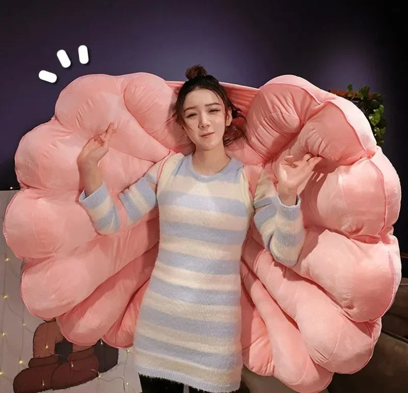 Giant clam shell plush pillow from MC THE BLACK DIAMOND, designed as a large seashell-shaped cushion for kid beds.