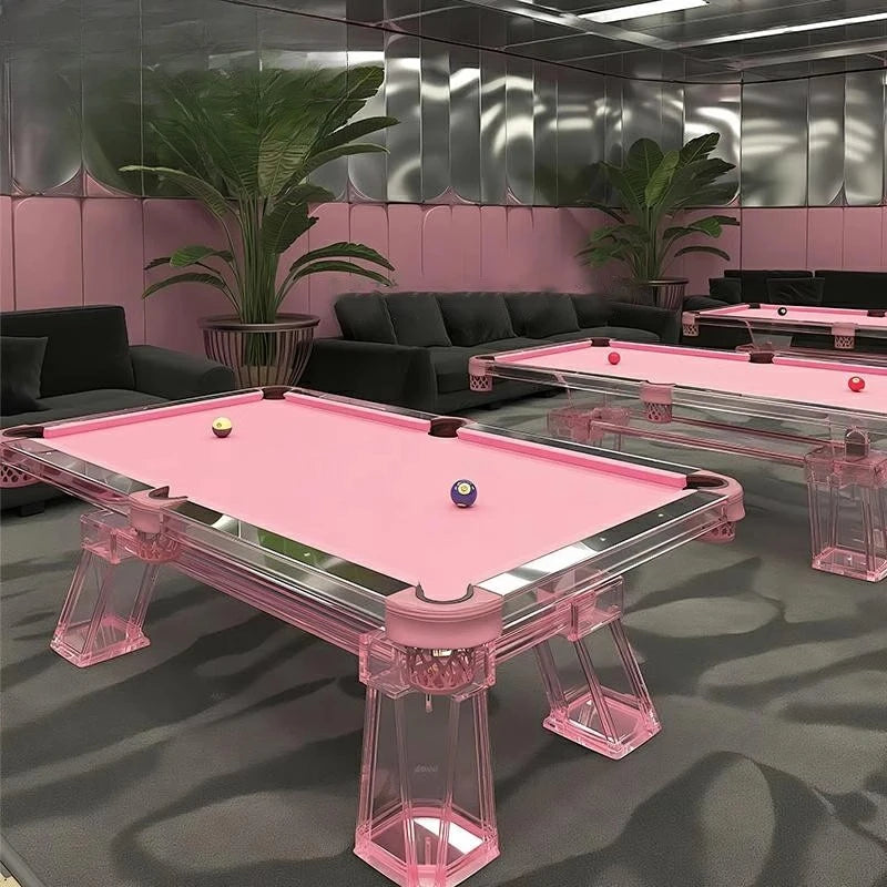 Pink acrylic billiard table by MC THE BLACK DIAMOND with a sleek, modern design for stylish home entertainment.
