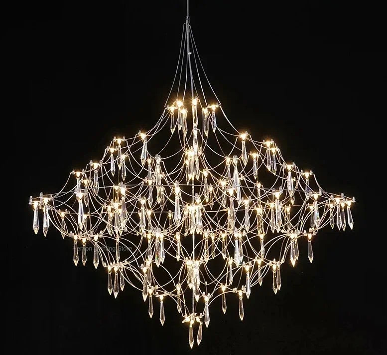 Modern chrome-plated luxury crystal chandelier by MC THE BLACK DIAMOND, featuring intricate crystal details for elegant living room lighting.