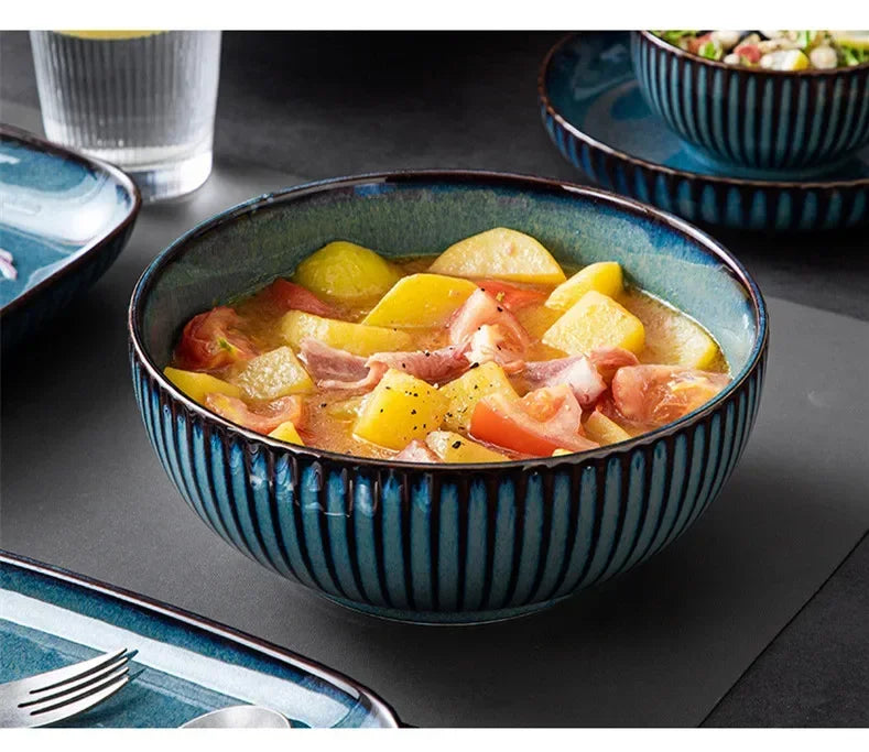 Blue kiln glaze ceramic plate from Mc The Black Diamonds, designed for rice and salads, showcasing a sleek, glossy finish.