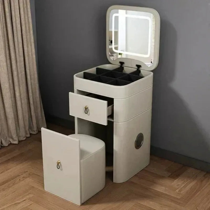 Modern makeup vanity with storage drawer, luxurious mirror, and stool by MC THE BLACK DIAMOND, featuring sleek design and functional features.