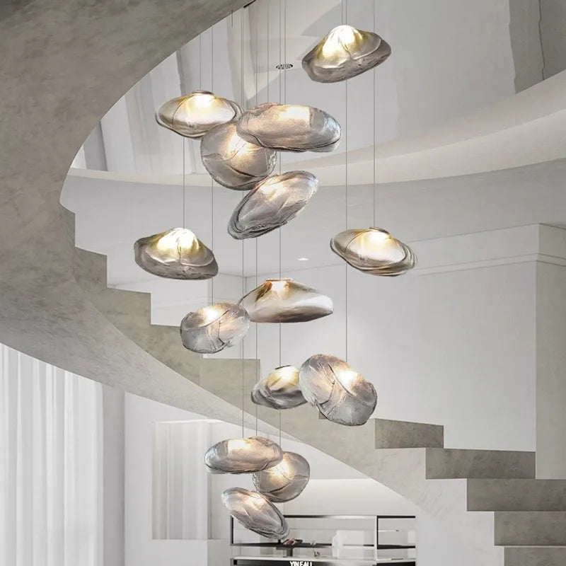 Elegant MC THE BLACK DIAMOND modern crystal chandelier with multiple hanging crystals and a sleek lighting fixture design.