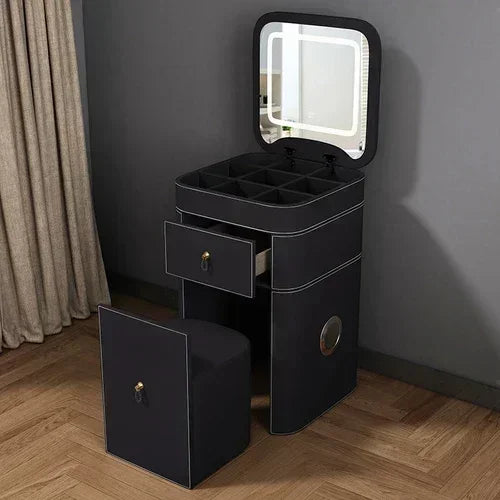 Modern makeup vanity with storage drawer, luxurious mirror, and stool by MC THE BLACK DIAMOND. Elegant beauty station setup.