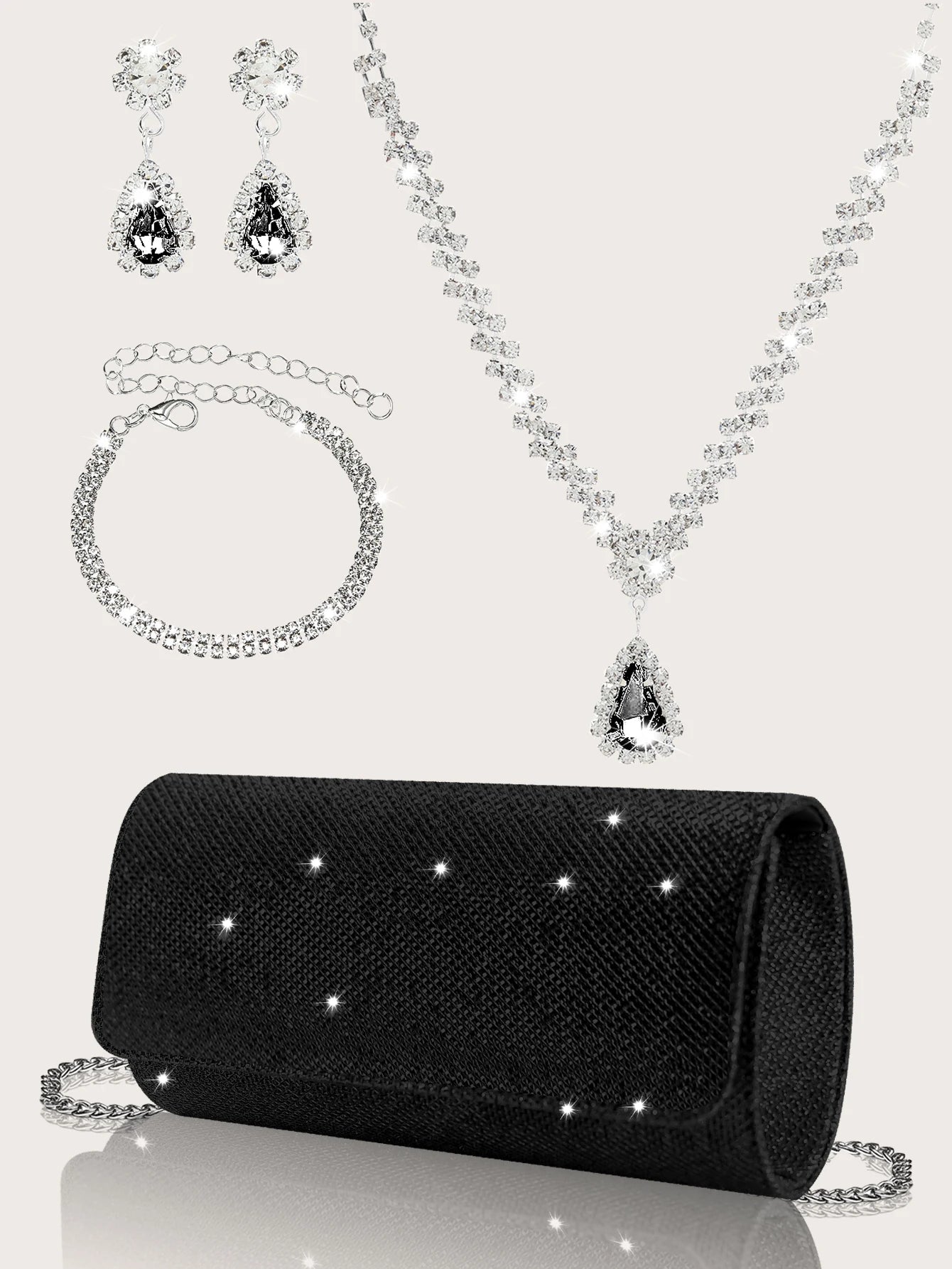 Elegant black sparkly MC THE BLACK DIAMOND hand bag with rhinestone jewelry set including necklace, earrings, and bracelet.