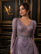 MC THE BLACK DIAMOND long sleeve evening dress for women, elegant black dress with fitted design and sophisticated style.