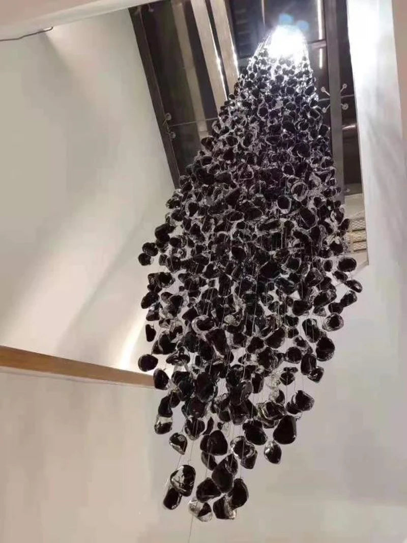 Large modern stone crystal LED chandelier by MC THE BLACK DIAMOND, featuring luxurious design for staircase or living room lighting.