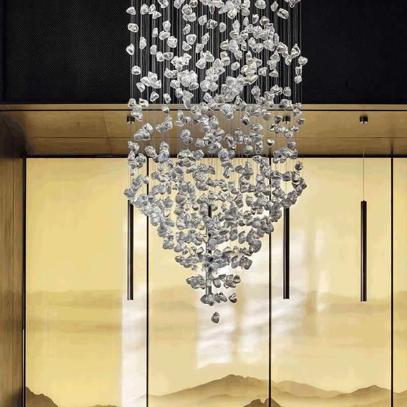 Modern stone crystal LED chandelier by MC THE BLACK DIAMOND, large luxury staircase and living room lighting fixture with elegant design.
