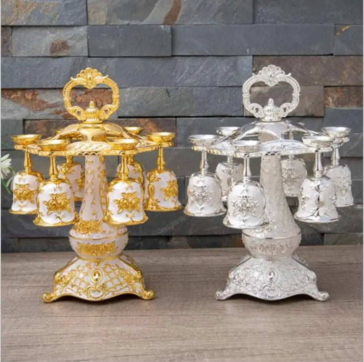 Gold and silver decorative cups from MC The Black Diamond drinkware set, featuring elegant design in the image.