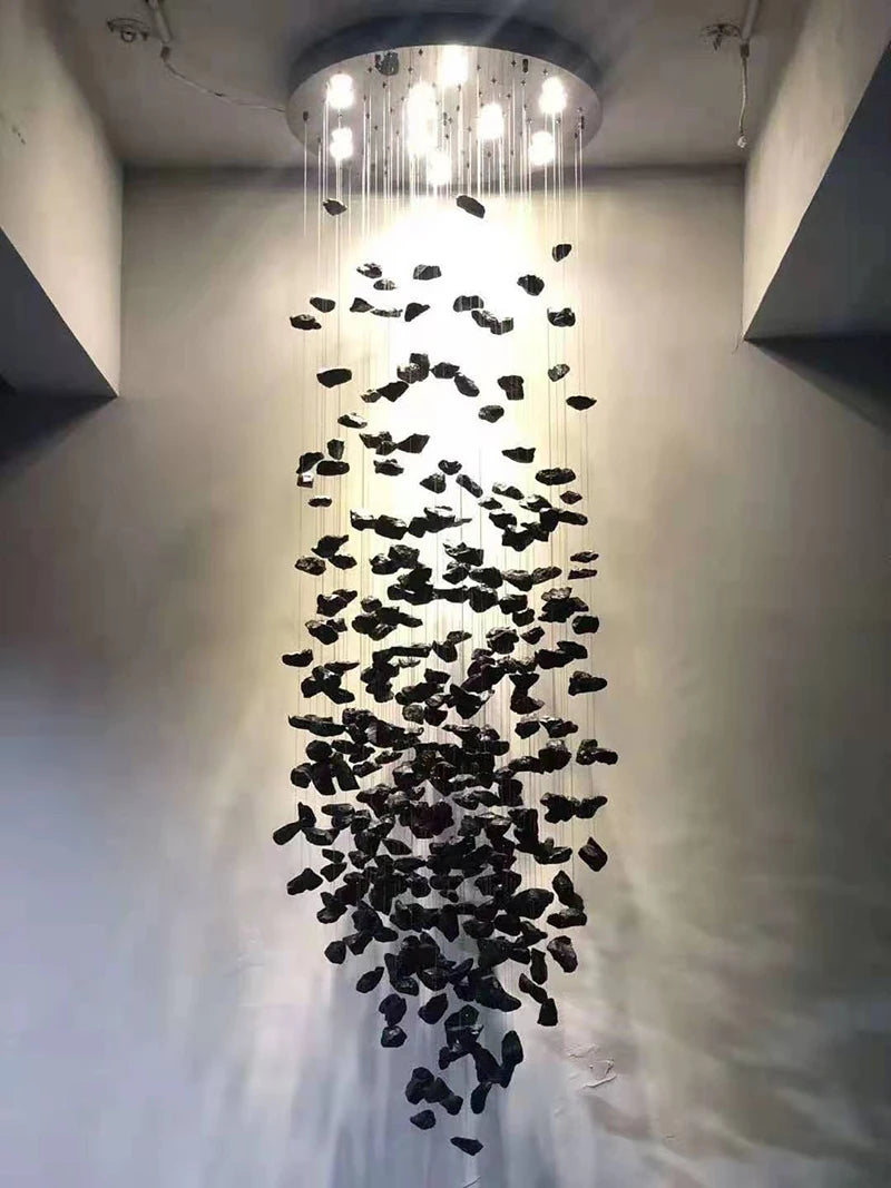 Modern stone crystal LED chandelier by MC THE BLACK DIAMOND, large luxury staircase and living room lighting fixture with elegant design.