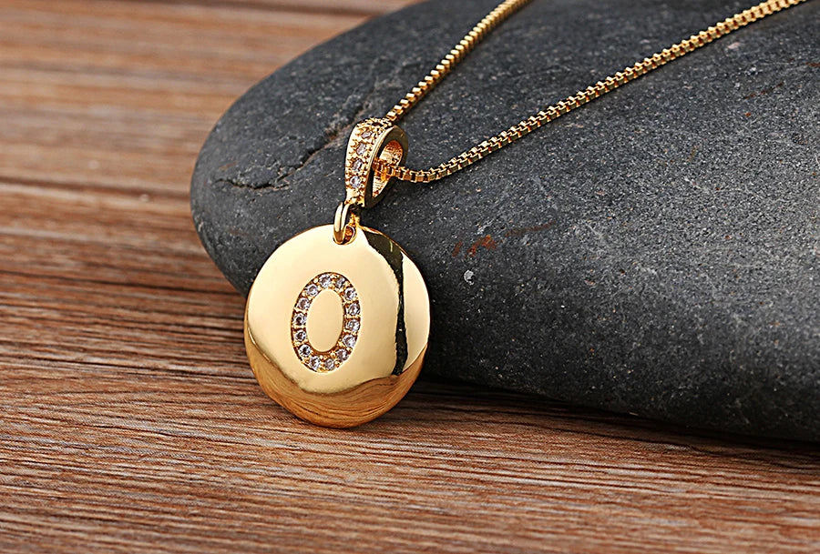 Copper initial letter necklace for women and girls featuring a CZ charm, from 𝕄𝕔 𝕋𝕙𝕖 𝔹𝕝𝕒𝕔𝕜 𝔻𝕚𝕒𝕞
