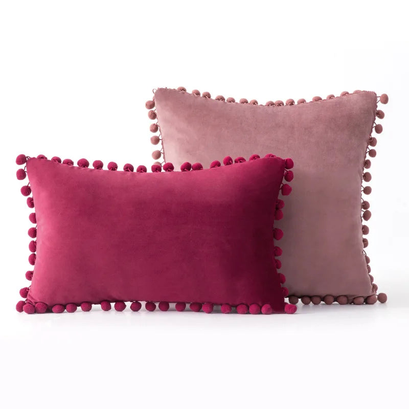 Soft velvet throw pillow cover by MC The Black Diamond, solid color with pom-pom accents, large cozy sofa cushion case.