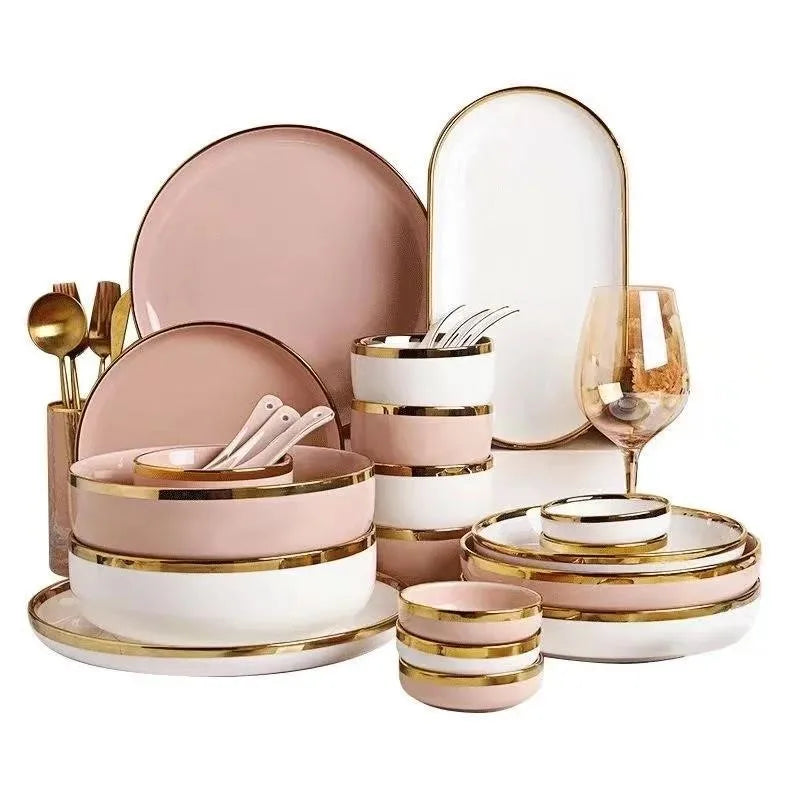 Set of bright white and pink porcelain plates with gold accents, designed for elegant kitchen dining by MC THE BLACK DIAMOND.
