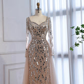 MC Luxury Arabic nude long sleeve mermaid evening dress by MC THE BLACK DIAMOND featuring fitted silhouette and elegant design.