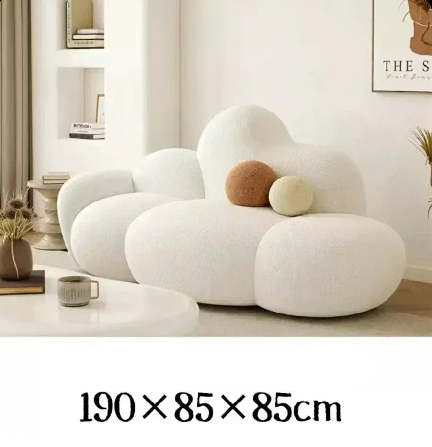 Comfortable MC THE BLACK DIAMOND sofa in a living room setting with plush cushions and modern design.