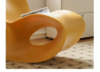 Modern MC THE BLACK DIAMOND rocking lounge armchair in white polyethylene with a sleek, rotational-molded design for contemporary spaces.