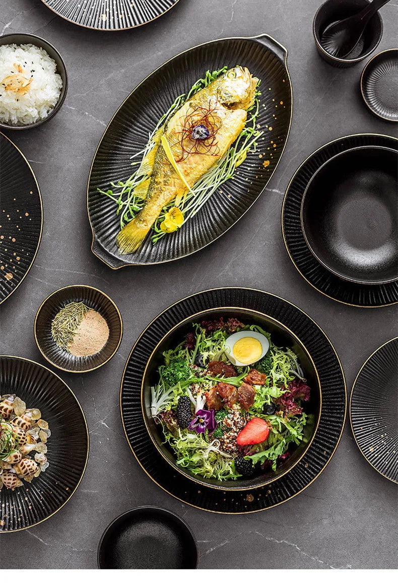Set of black porcelain dinner plates with gilt rims, including food trays and bowls, from 𝕄𝕔 𝕋𝕙𝕖 𝔹𝕝𝕒𝕔𝕜 𝔻𝕚𝕒