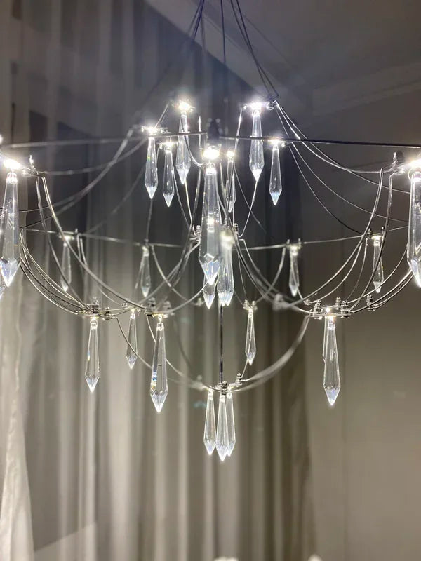 Modern chrome-plated luxury crystal chandelier by MC THE BLACK DIAMOND, featuring intricate hanging crystals for elegant living room lighting.