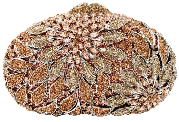 Gold metal leaf and white crystal evening clutch bag by MC THE BLACK DIAMOND, luxury mini heart-shaped handbag with rhinestones for women.