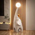 Modern black elephant sculpture by MC THE BLACK DIAMOND, decorative animal statue for living room or home decor.